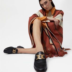 Tod’s Black Leather Loafers